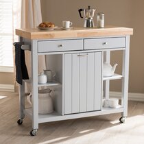 Kitchen island with online garbage bin and seating